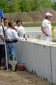 Deb Youngdahl and Kirk Bendix train in two new corner workers at turn 13.