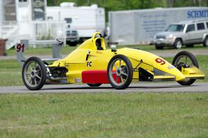 Mike Fowler's Van Diemen RF96 Formula Continental in the paddock.