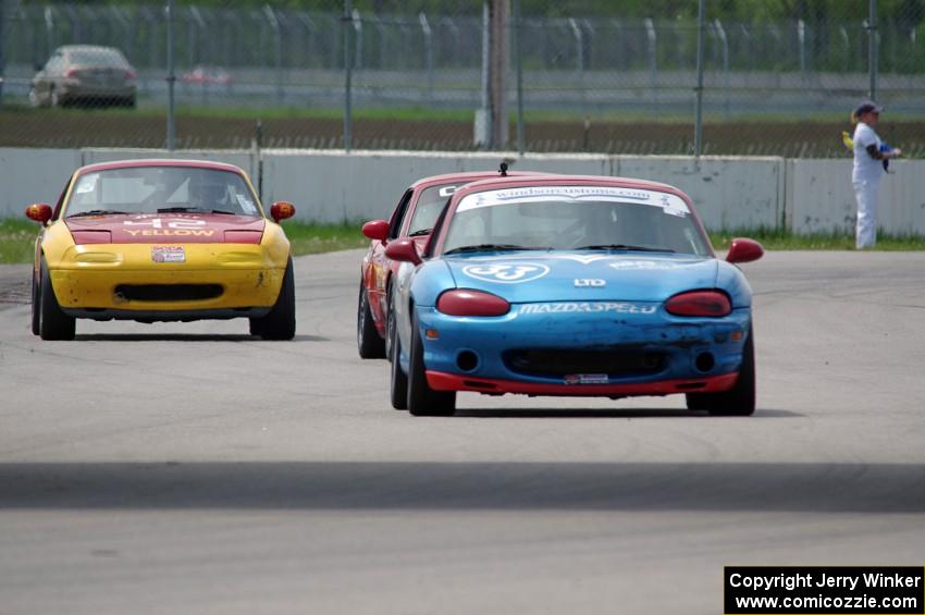 Rick Buan's, Andrew Jenkins' and Greg Youngdahl's Spec Miata Mazda Miatas