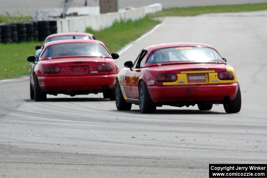 Rick Buan's, Andrew Jenkins' and Greg Youngdahl's Spec Miata Mazda Miatas