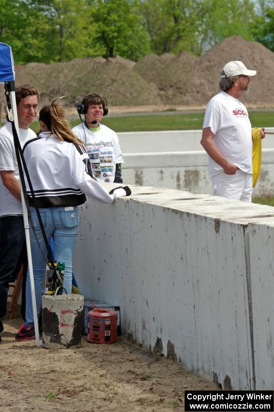 Deb Youngdahl and Kirk Bendix train in two new corner workers at turn 13.