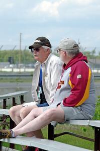 Zane Emstad and Don Haaversen watch the races from the bleachers at turn 3.