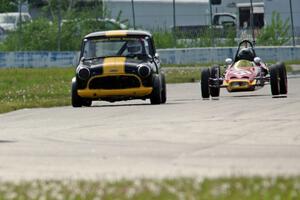 Greg Wold's Morris Mini-Cooper S and Paul Bastyr's McNamara Formula Vee