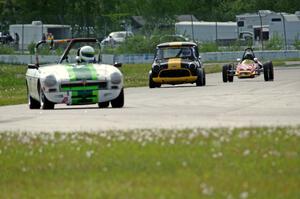 Steve Nichols' MGB, Greg Wold's Morris Mini-Cooper S and Paul Bastyr's McNamara Formula Vee