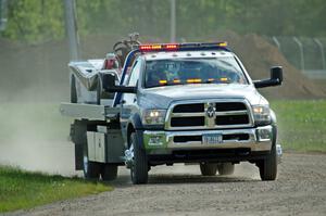 Craig Wheatley's Spec Racer Ford comes in on the flatbed.