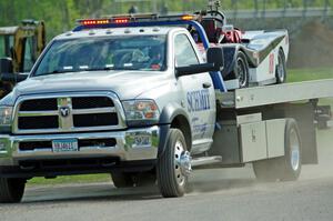 Craig Wheatley's Spec Racer Ford comes in on the flatbed.