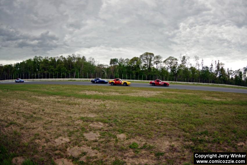 Andrew Jenkins', Greg Youngdahl's, Craig Silver's and Rick Buan's Spec Miata Mazda Miatas