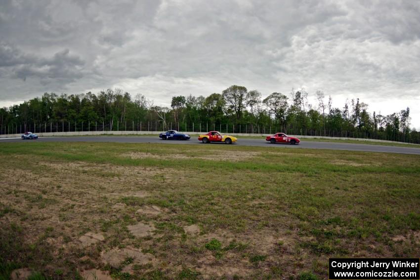 Andrew Jenkins', Greg Youngdahl's, Craig Silver's and Rick Buan's Spec Miata Mazda Miatas