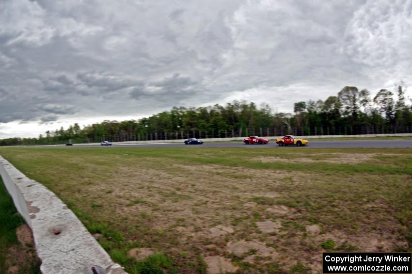 Greg Youngdahl's, Andrew Jenkins', Craig Silver's and Rick Buan's Spec Miata Mazda Miatas