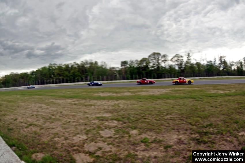 Greg Youngdahl's, Andrew Jenkins', Craig Silver's and Rick Buan's Spec Miata Mazda Miatas