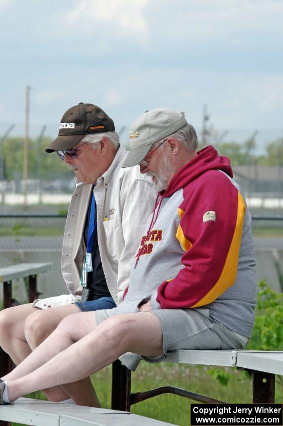 Zane Emstad and Don Haaversen watch the races from the bleachers at turn 3.