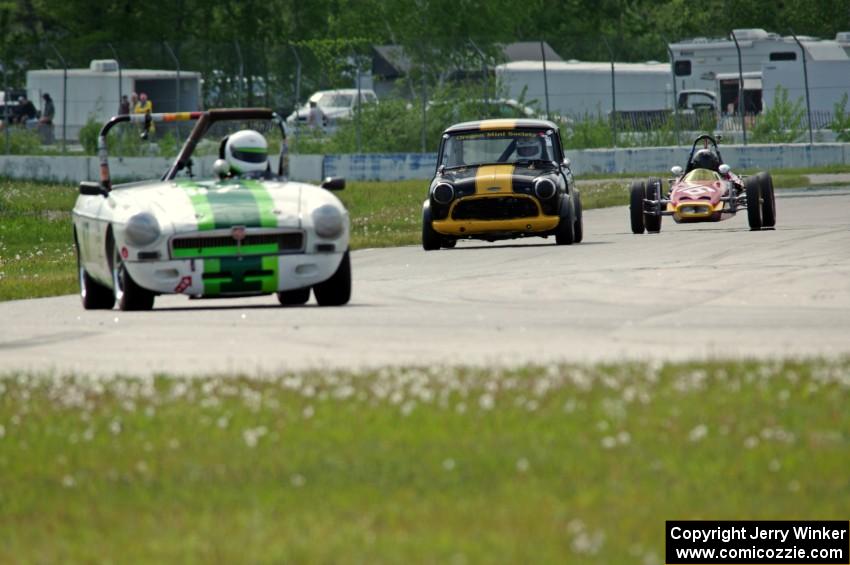 Steve Nichols' MGB, Greg Wold's Morris Mini-Cooper S and Paul Bastyr's McNamara Formula Vee