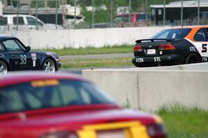 Patrick Price's ITA Nissan 200SX SE-R and Craig Stephens' ITE-1 Porsche 911