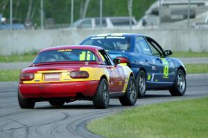 John Glowaski's ITA Dodge Neon ACR and Greg Youngdahl's ITA Mazda Miata