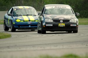 Tom Daly's STU VW Rabbit and John Glowaski's ITA Dodge Neon ACR