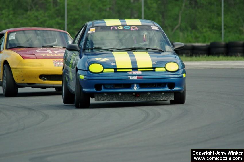 John Glowaski's ITA Dodge Neon ACR and Greg Youngdahl's ITA Mazda Miata