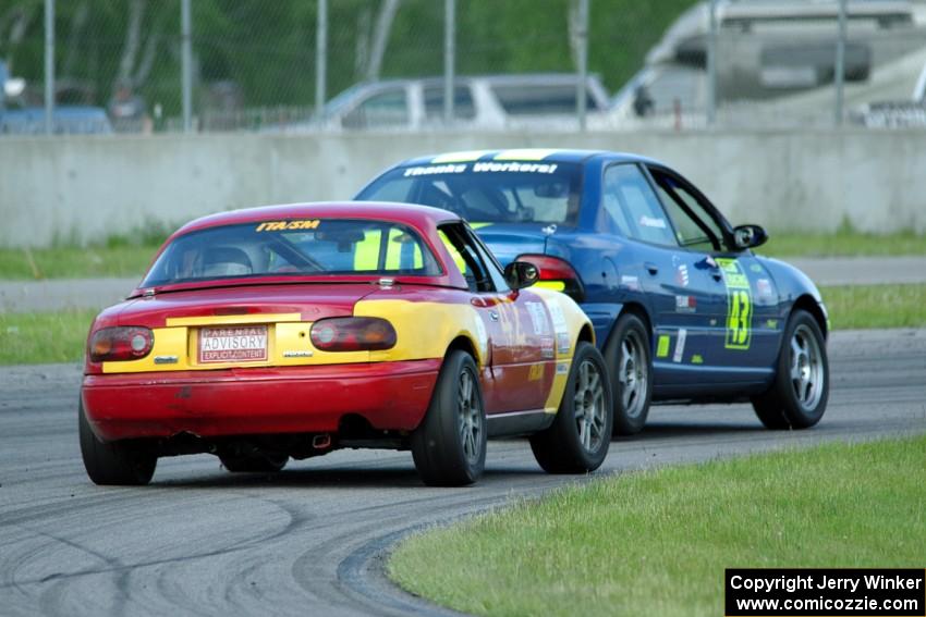 John Glowaski's ITA Dodge Neon ACR and Greg Youngdahl's ITA Mazda Miata