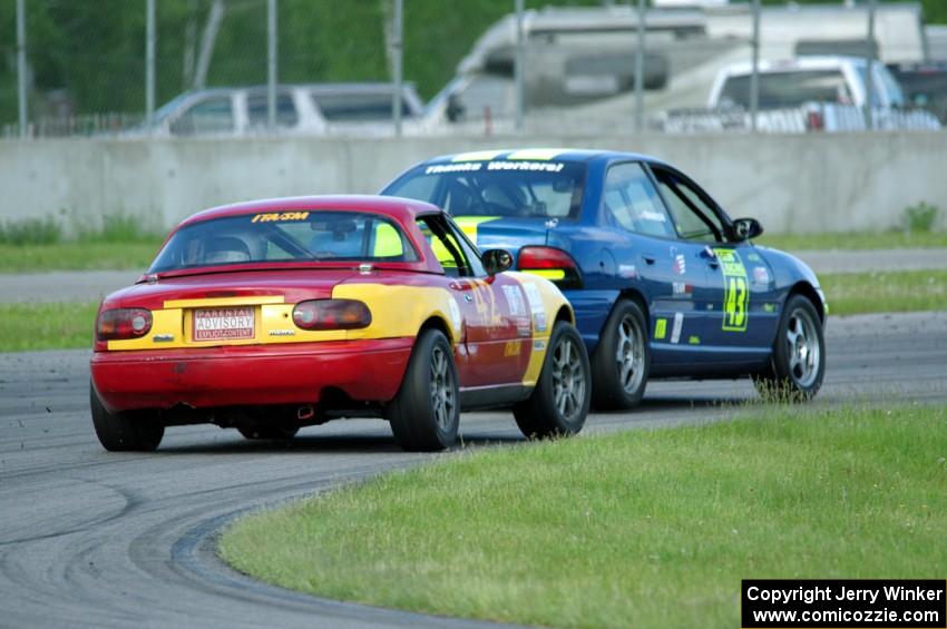 John Glowaski's ITA Dodge Neon ACR and Greg Youngdahl's ITA Mazda Miata