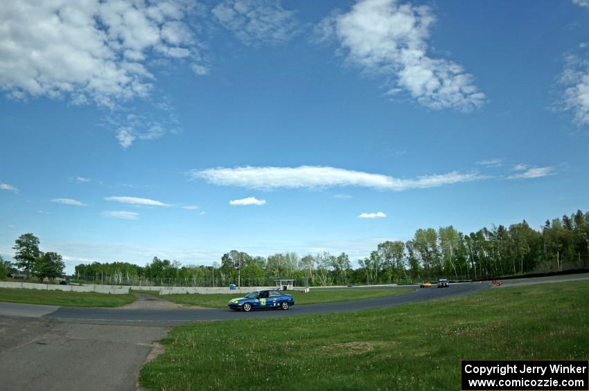 John Glowaski's ITA Dodge Neon ACR, Tom Daly's STU VW Rabbit and Greg Youngdahl's ITA Mazda Miata