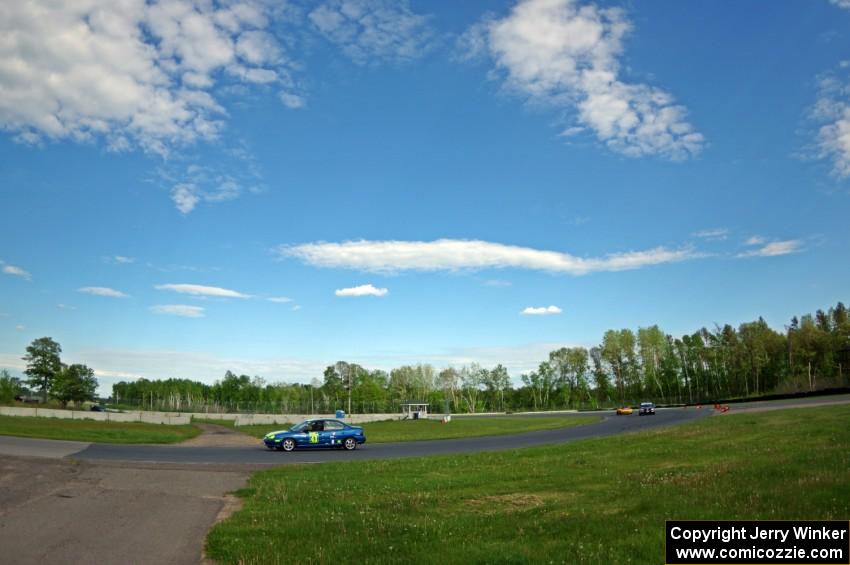 John Glowaski's ITA Dodge Neon ACR, Tom Daly's STU VW Rabbit and Greg Youngdahl's ITA Mazda Miata