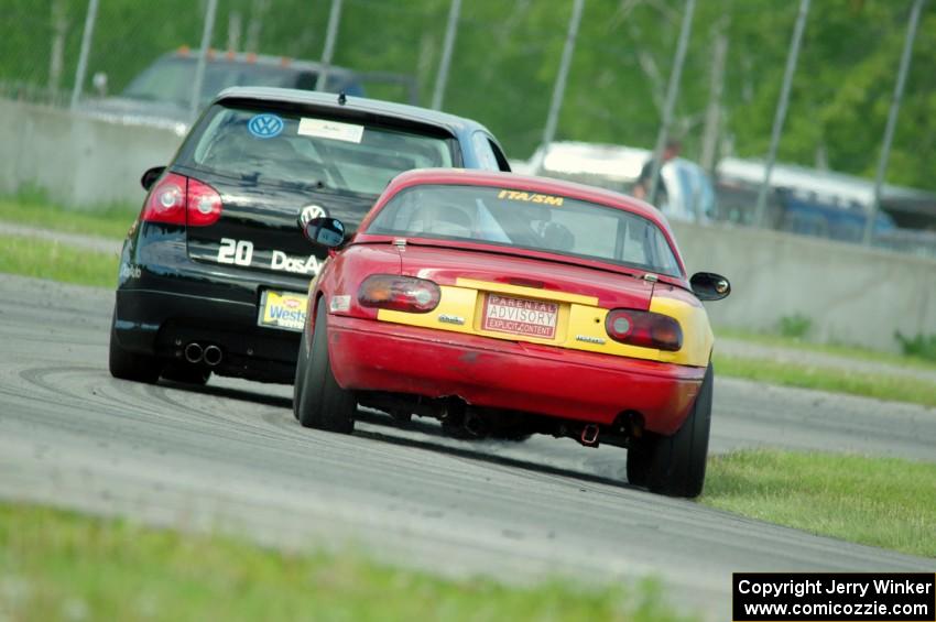 Greg Youngdahl's ITA Mazda Miata chases Tom Daly's STU VW Rabbit