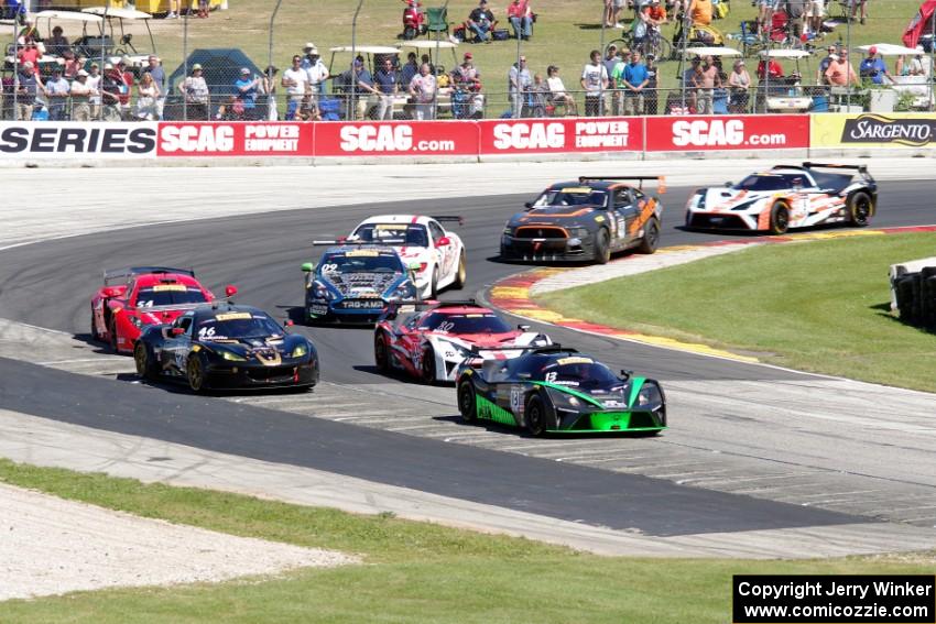 The field comes into turn 5 during the first lap of race 2.