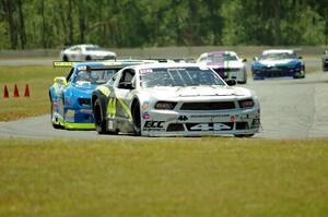 Adam Andretti's Ford Mustang and Tommy Archer's Chevy Camaro