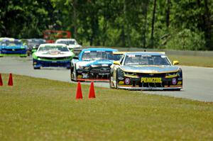 Lawrence Loshak's Chevy Camaro and Tony Buffomante's Ford Mustang lead the rest of the field.