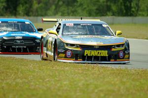 Lawrence Loshak's Chevy Camaro and Tony Buffomante's Ford Mustang