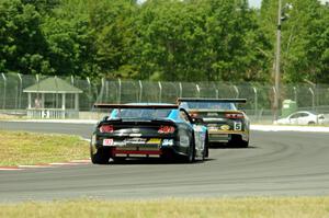 Lawrence Loshak's Chevy Camaro and Tony Buffomante's Ford Mustang