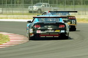 Lawrence Loshak's Chevy Camaro and Tony Buffomante's Ford Mustang
