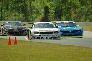 Adam Andretti's Ford Mustang, Tommy Archer's Chevy Camaro and Dillon Machavern's Ford Mustang