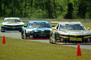 Lawrence Loshak's Chevy Camaro, Tony Buffomante's Ford Mustang and Gar Robinson's Chevy Camaro