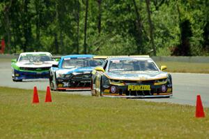 Lawrence Loshak's Chevy Camaro, Tony Buffomante's Ford Mustang and Gar Robinson's Chevy Camaro