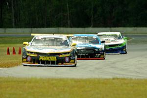 Lawrence Loshak's Chevy Camaro, Tony Buffomante's Ford Mustang and Gar Robinson's Chevy Camaro