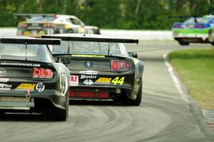 Justin Haley's Ford Mustang chases Adam Andretti's Ford Mustang