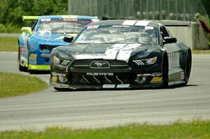 Justin Haley's Ford Mustang and Tommy Archer's Chevy Camaro