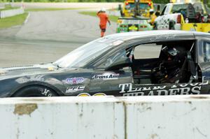John Atwell pulls his Chevy Camaro off course at turn 12.