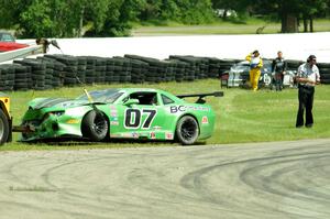 Jordan Bernloehr's Chevy Camaro is towed aff the track after the race.