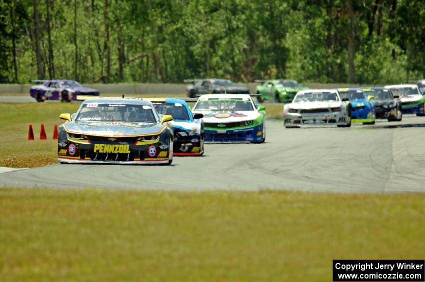 Lawrence Loshak's Chevy Camaro, Tony Buffomante's Ford Mustang and Gar Robinson's Chevy Camaro lead the field.