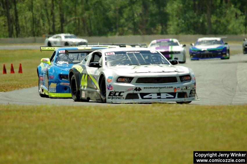 Adam Andretti's Ford Mustang and Tommy Archer's Chevy Camaro