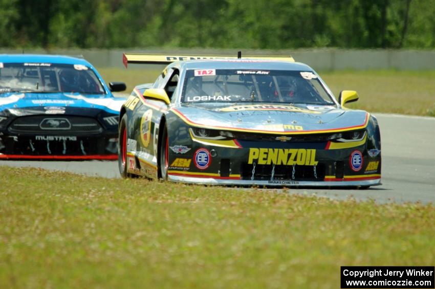 Lawrence Loshak's Chevy Camaro and Tony Buffomante's Ford Mustang