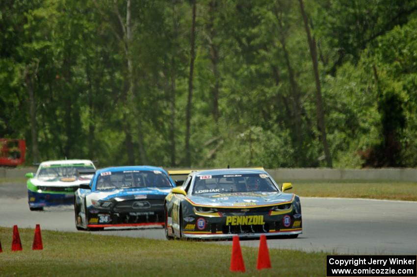 Lawrence Loshak's Chevy Camaro, Tony Buffomante's Ford Mustang and Gar Robinson's Chevy Camaro