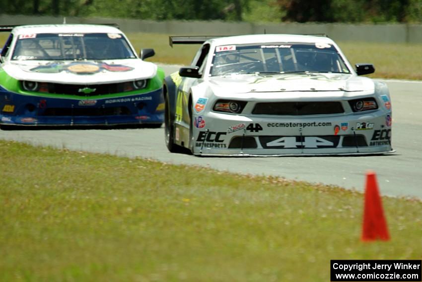 Shane Lewis' Chevy Camaro and Adam Andretti's Ford Mustang