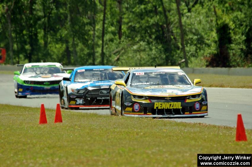 Lawrence Loshak's Chevy Camaro, Tony Buffomante's Ford Mustang and Gar Robinson's Chevy Camaro