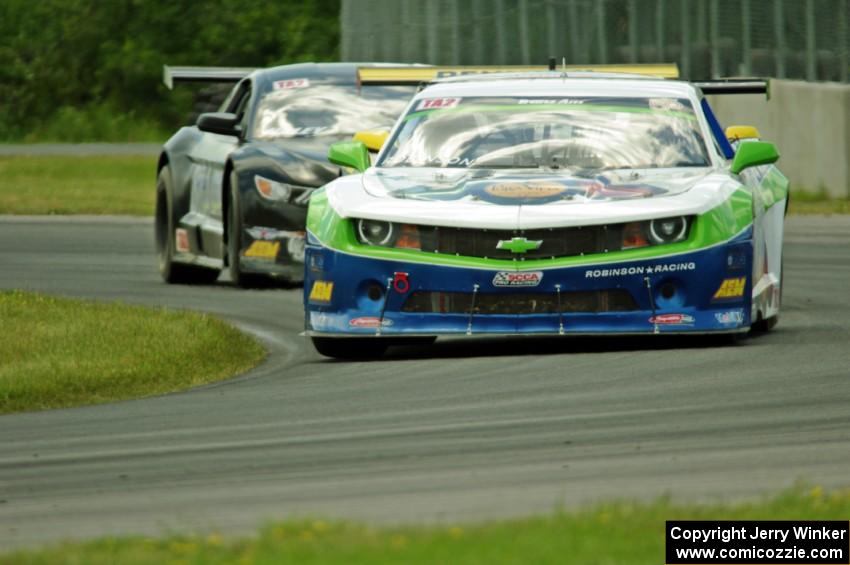 Gar Robinson's Chevy Camaro and Justin Haley's Ford Mustang