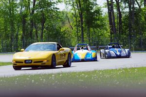 Jose Borrero's and Nate Smith's P2 Radical SR3s on the front row behind the pace car.