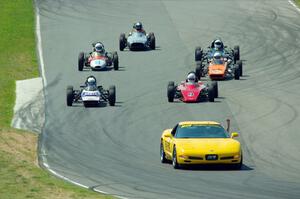 The field streams between turns five and six on the pace lap.