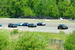 The Spec Miata and smaller production class field comes into turn 1 afier getting the green flag.