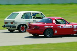 Andrew Jenkins' Spec Miata Mazda Miata and Jimmy Griggs' H Production VW Rabbit